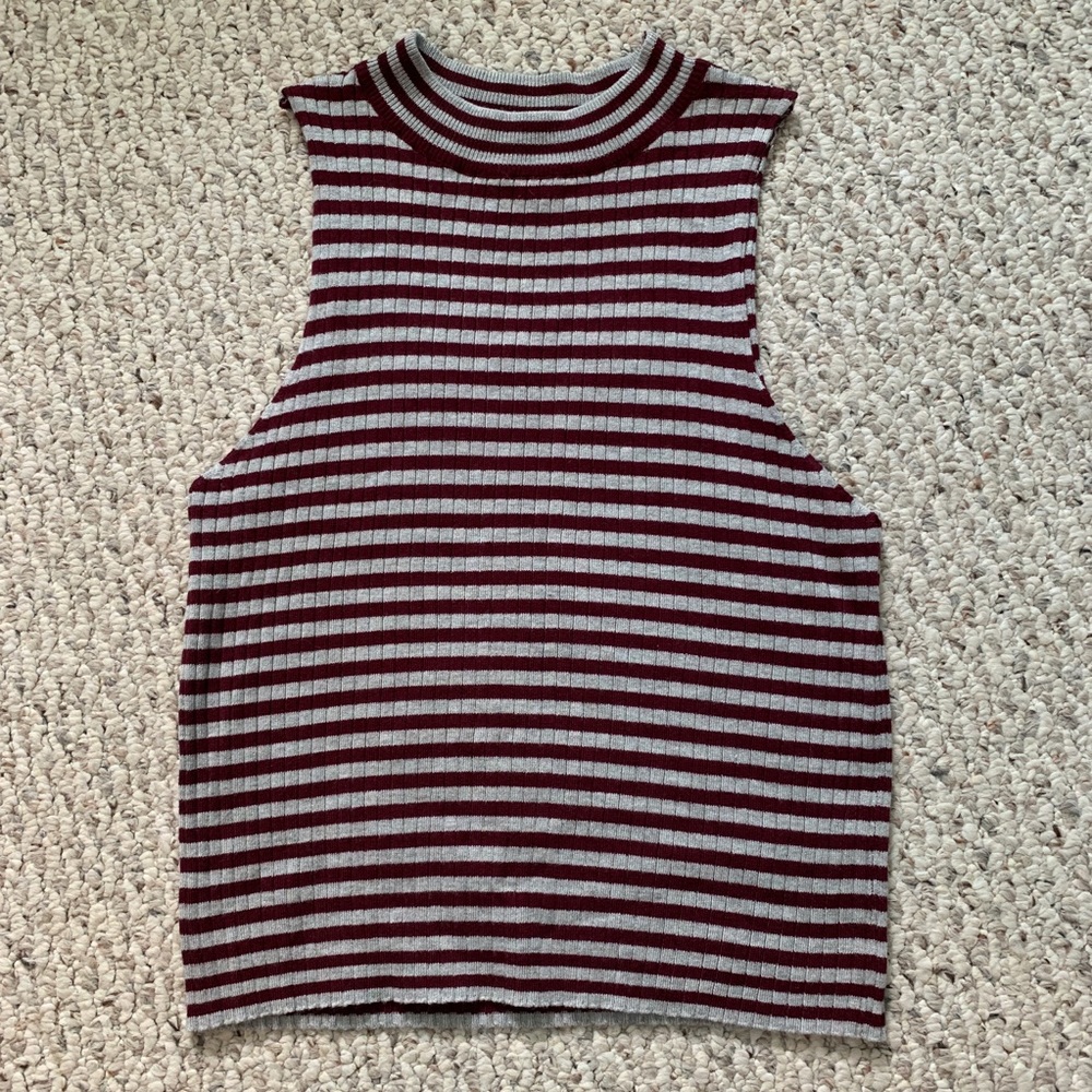 Striped high neck cut off sleeve shirt